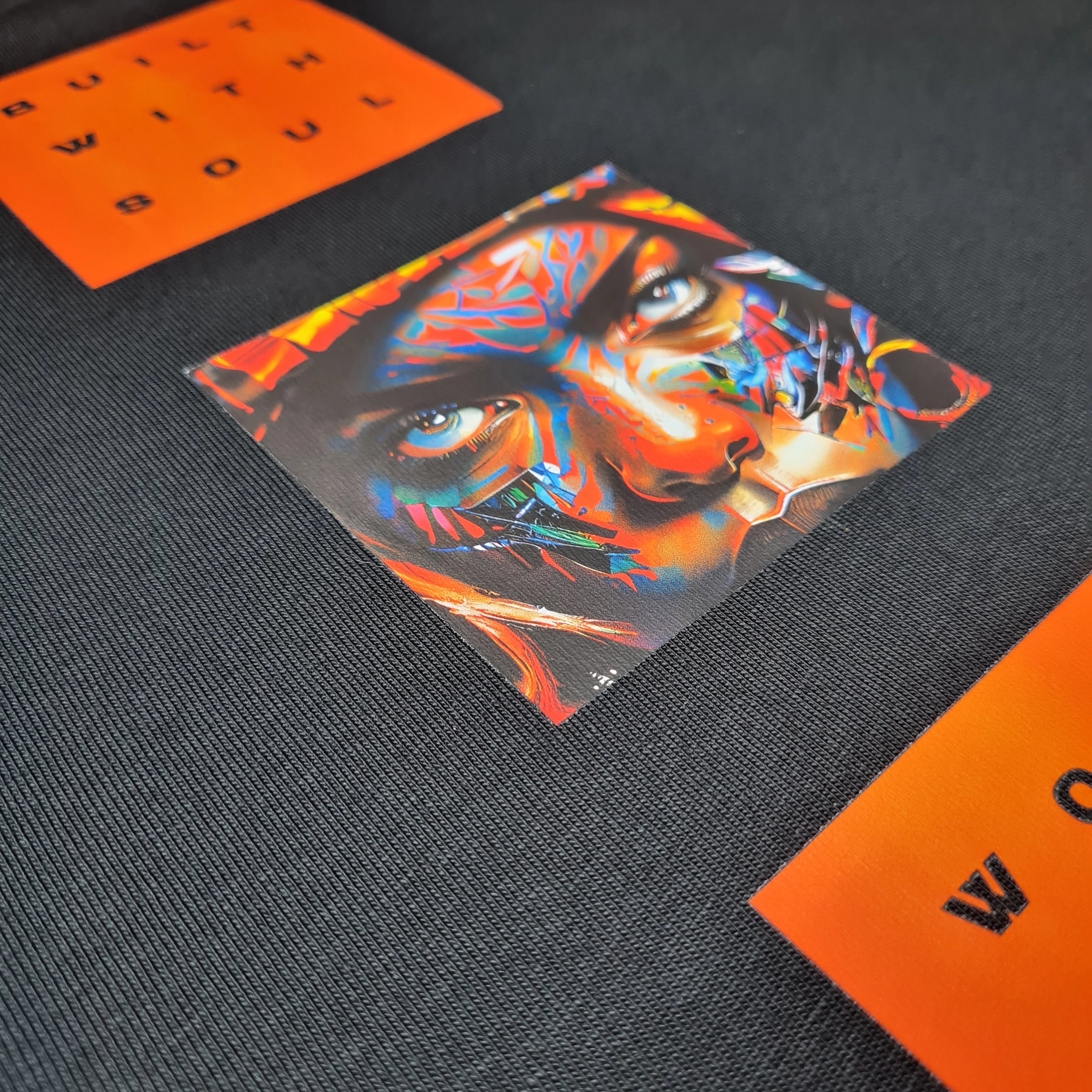 Colorful lion head design on a textured surface with orange text in the background