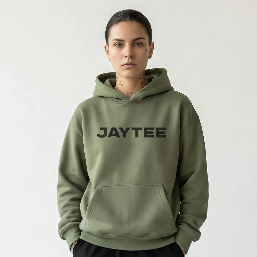 Person wearing a green hoodie with JAYTEE branding on a white background