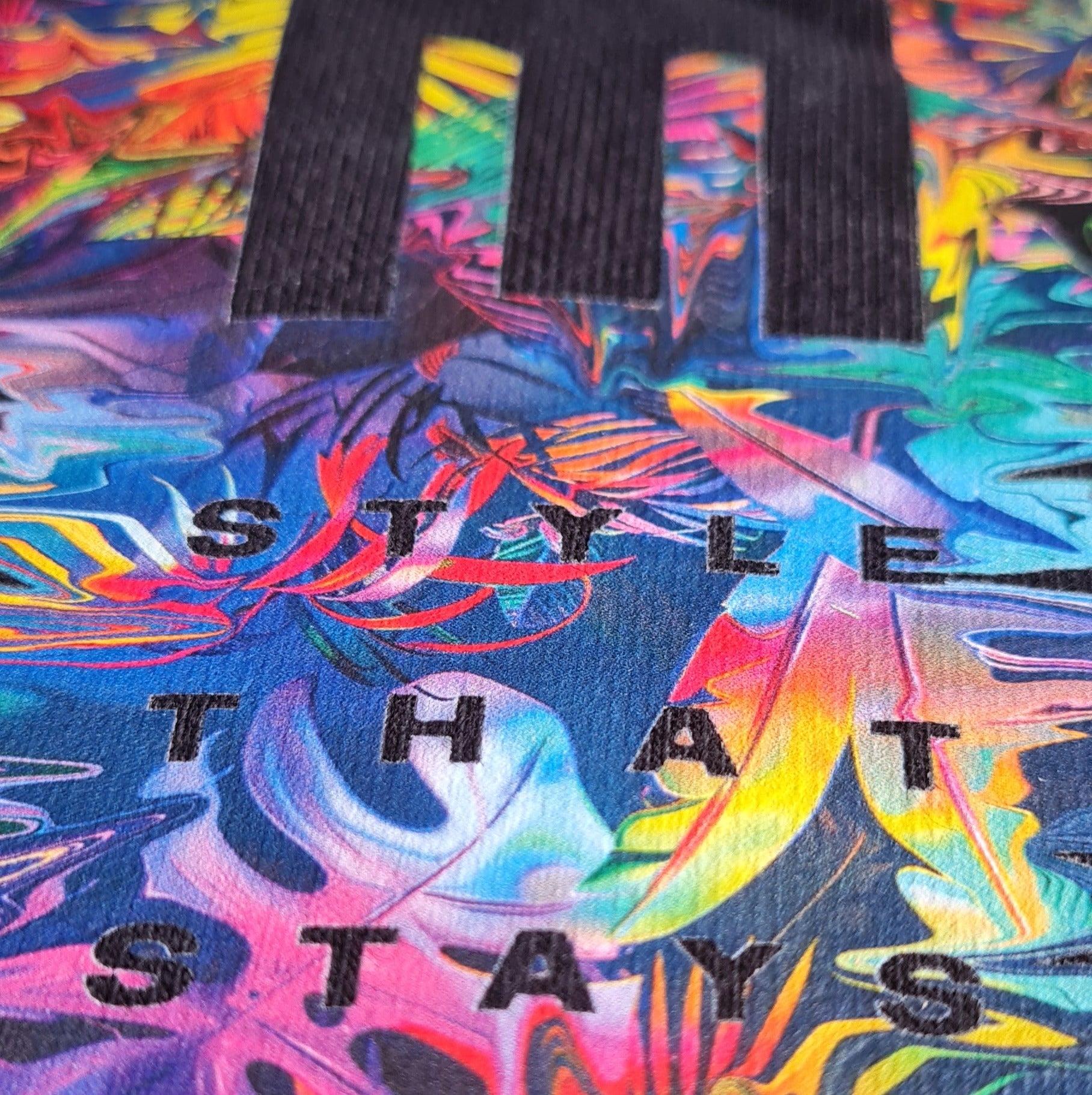 Colorful abstract pattern with text on a multicolored background