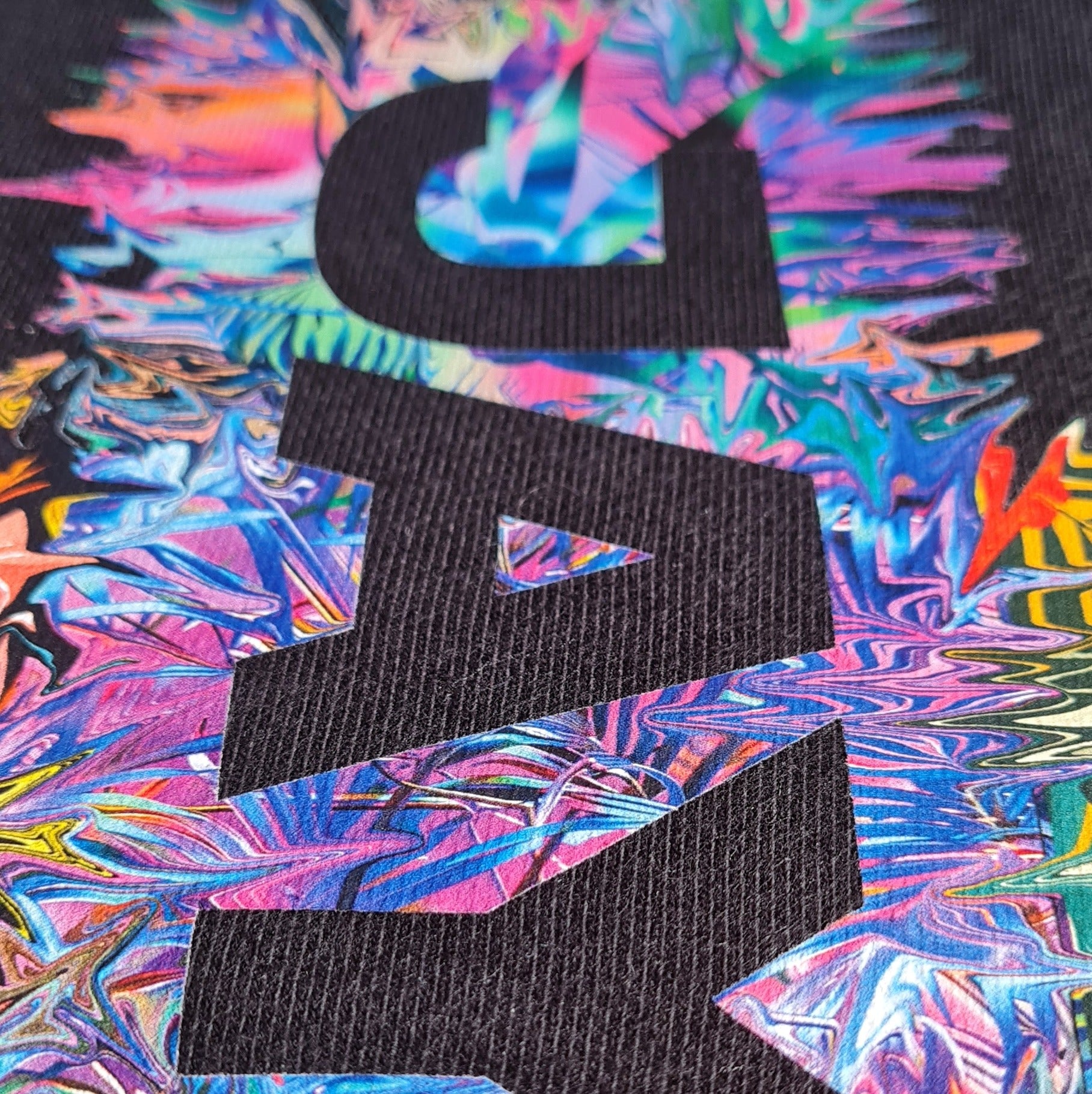 Black background with a colorful abstract background