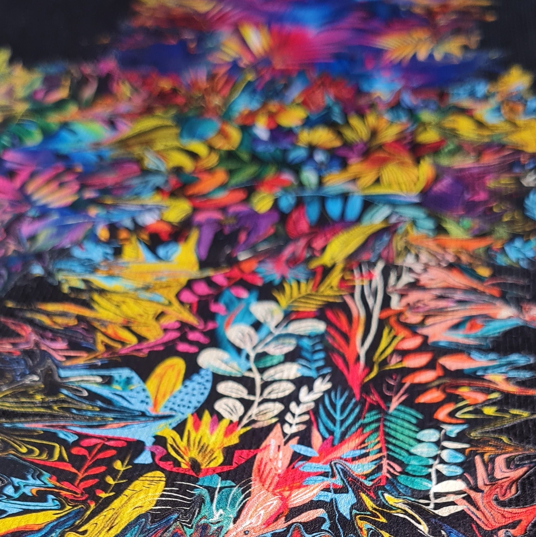 Multicolored abstract pattern with floral elements on a dark background