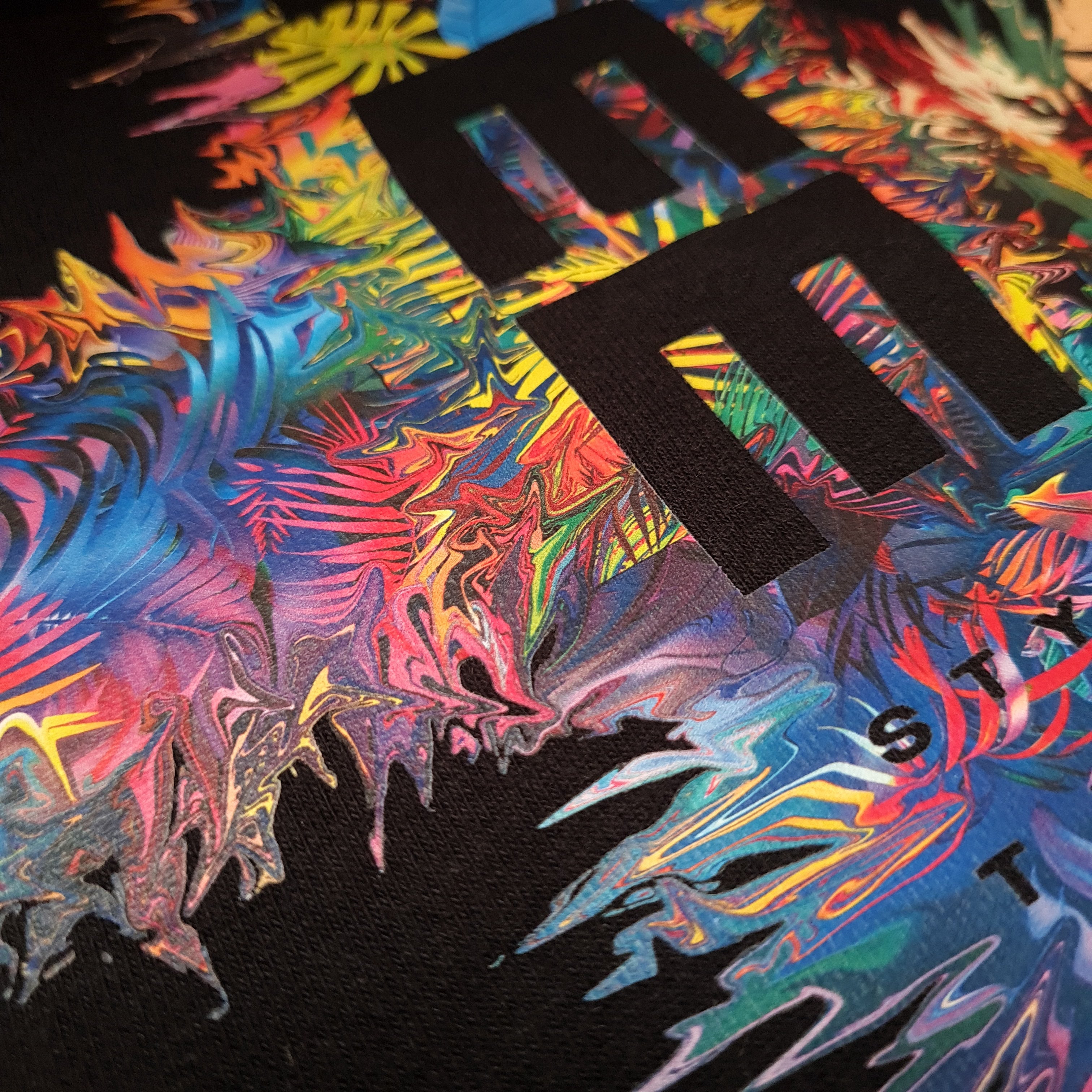 Colorful abstract design with the word 'ELEPHANT' in black text.