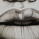 Close-up of a person's eyes with a cityscape reflection.