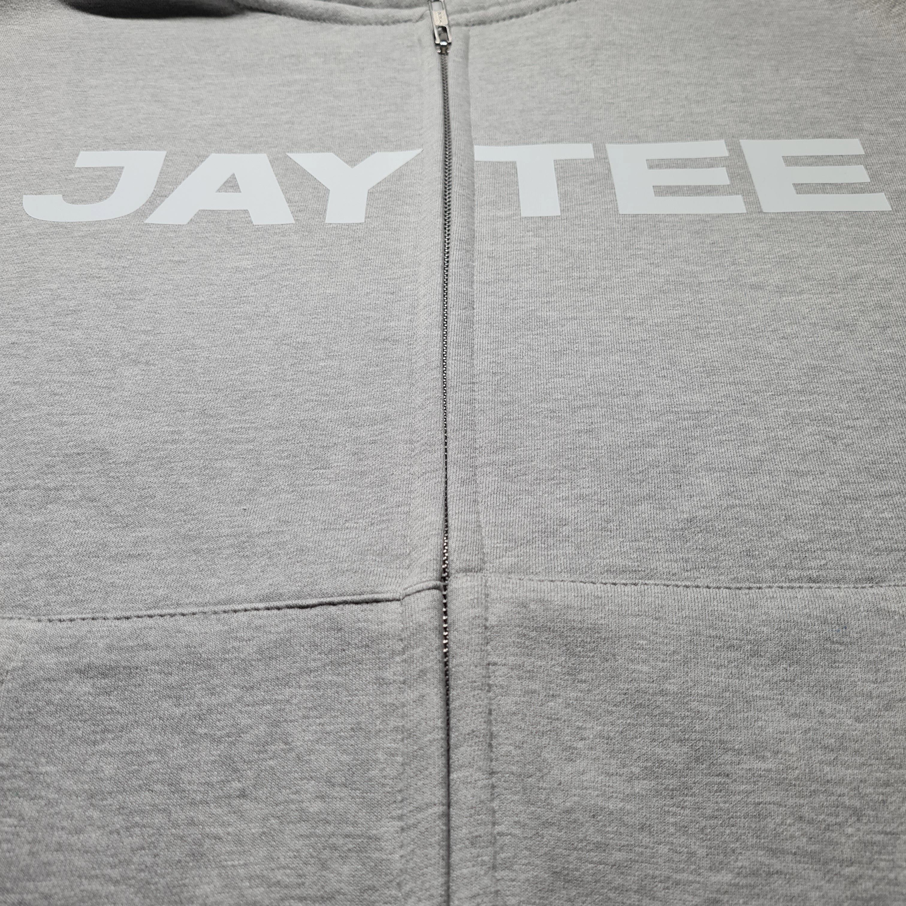 Gray hoodie with 'JAY TEE' printed on the chest