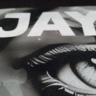 Close-up of a tire with 'Dunlop' branding on a dark background