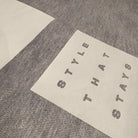 Textured surface with 'STYLE THAT STAYS' text