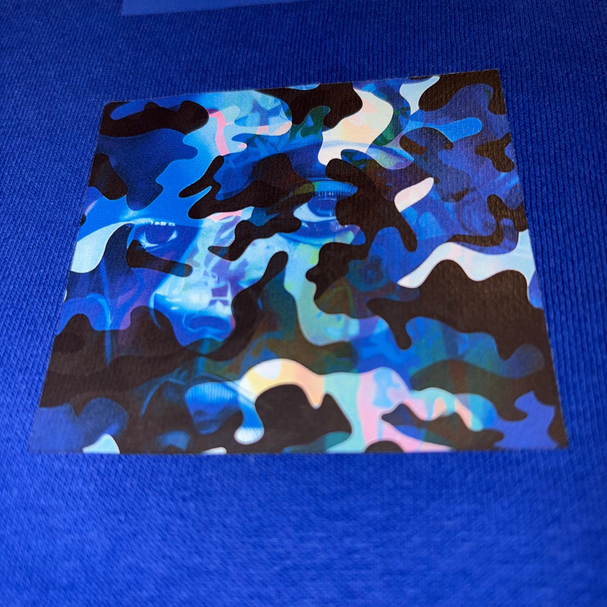 Blue camouflage pattern on a blue background
