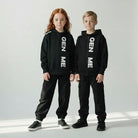 GEN ME hoodies boy and girl in studio setting