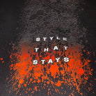 Spray effect in orange and black on black hoodie with STYLE THE STAYS