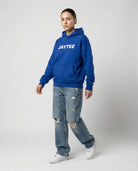 Blue hoodie with JAYTEE logo in white across the front