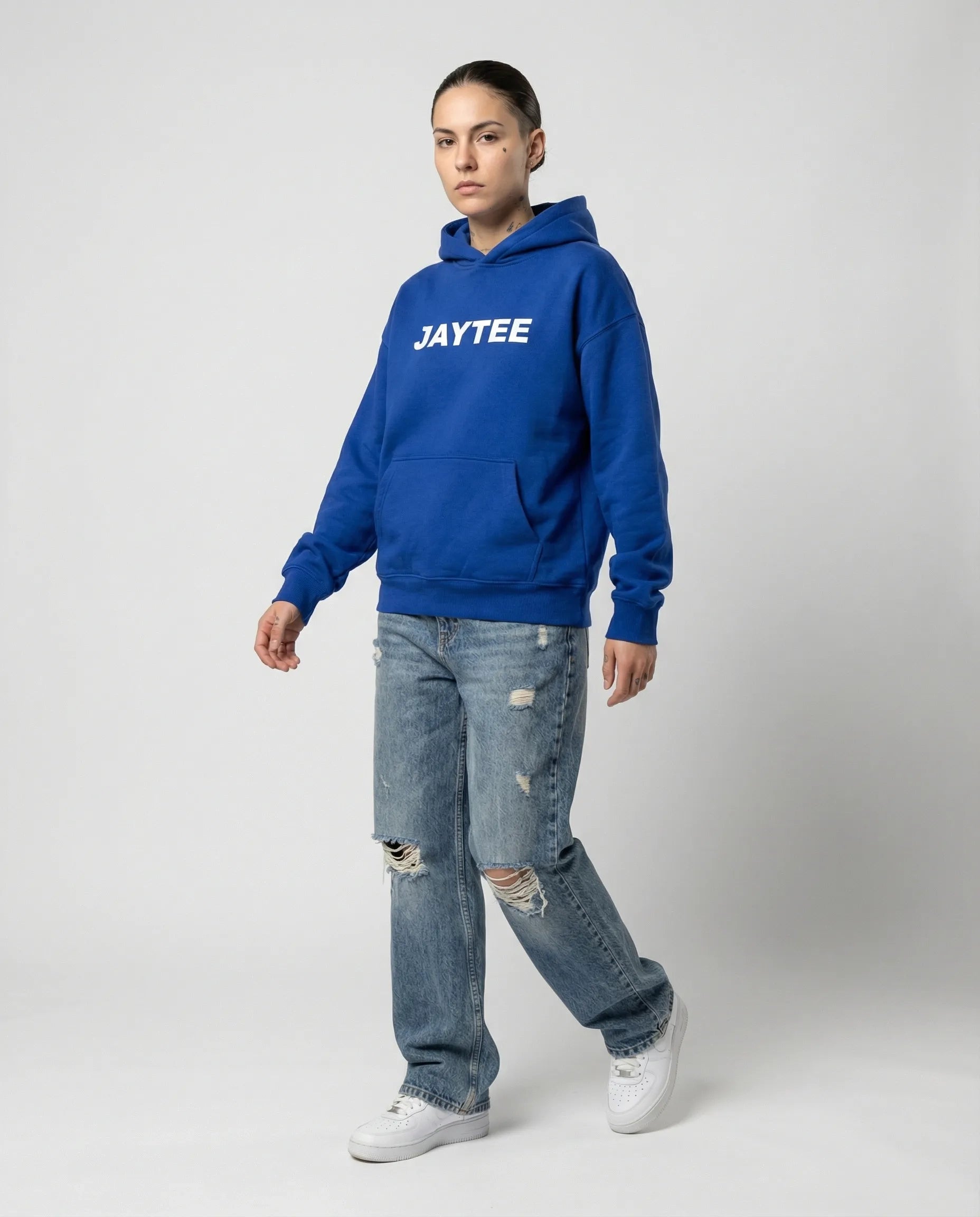 Blue hoodie with JAYTEE logo in white across the front