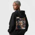 Person wearing a black JAYTEE hoodie with a graphic design on the back against a white background