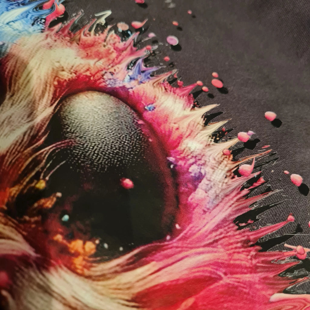 Close-up of a paw pad with colorful abstract patterns
